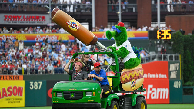 PHILADELPHIA, PA - JULY 19: The Phillie Phanatic shoots hotdogs at the fans during the game between the Philadelphia Phillies and the Los Angeles Angels on July 19th, 2025 at Citizens Bank Park in Philadelphia, PA.