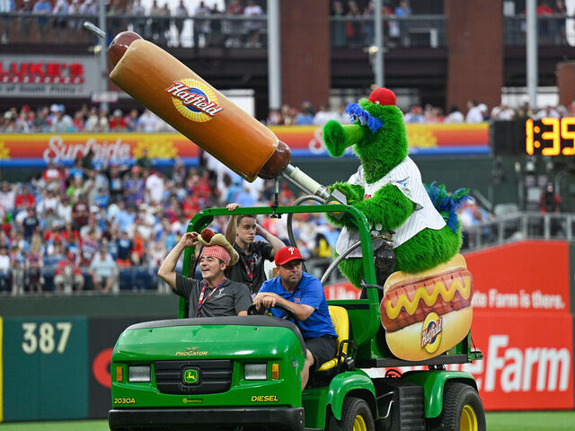 PHILADELPHIA, PA - JULY 19: The Phillie Phanatic shoots hotdogs at the fans during the game between the Philadelphia Phillies and the Los Angeles Angels on July 19th, 2025 at Citizens Bank Park in Philadelphia, PA.