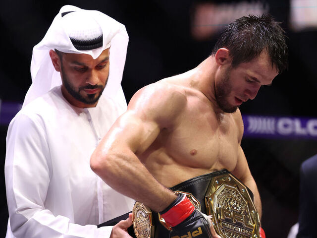 DUBAI, UNITED ARAB EMIRATES - OCTOBER 03: Usman Nurmagomedov receives the Lightweight belt after defeating Paul Hughes of Ireland in the PFL Lightweight World Title Fight during the PFL Championship Series :Road to Dubai on October 03, 2025 in Dubai, United Arab Emirates.