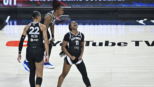 LAS VEGAS, NV - OCTOBER 3: Dana Evans #11 and Chelsea Gray #12 of the Las Vegas Aces celebrates during the game against the Phoenix Mercury during Game 1 of the 2025 WNBA Finals on October 3, 2025 at Michelob ULTRA Arena n Las Vegas, Nevada. Mandatory Copyright Notice: Copyright 2025 NBAE