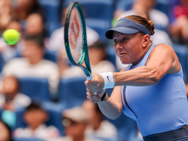BEIJING, CHINA - OCTOBER 04: Amanda Anisimova of the United States returns a shot in the Women's Singles Semifinal match against Coco Gauff of the United States on day 13 of the 2025 China Open at the National Tennis Center on October 4, 2025 in Beijing, China.