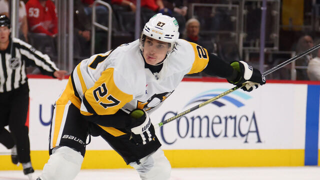 DETROIT, MICHIGAN - SEPTEMBER 29: Ryan Graves #27 of the Pittsburgh Penguins plays against the Detroit Red Wings during a preseason game at Little Caesars Arena on September 29, 2025 in Detroit, Michigan.