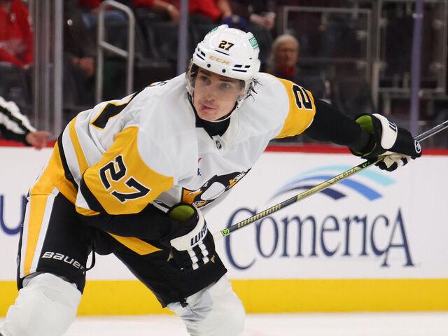 DETROIT, MICHIGAN - SEPTEMBER 29: Ryan Graves #27 of the Pittsburgh Penguins plays against the Detroit Red Wings during a preseason game at Little Caesars Arena on September 29, 2025 in Detroit, Michigan.