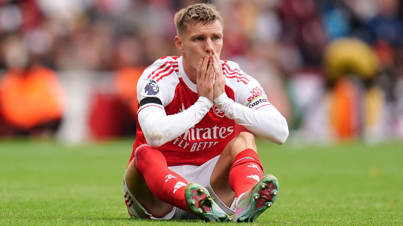 Arsenal's Martin Odegaard reacts after going down injured after a challenge during the Premier League match at the Emirates Stadium, London. Picture date: Saturday October 4, 2025.