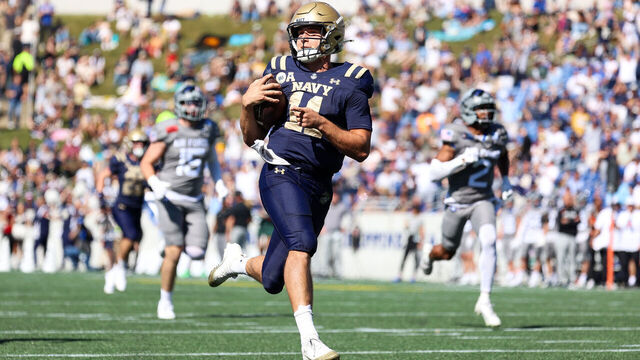 ANNAPOLIS, MARYLAND - OCTOBER 4: Blake Horvath #11 of the Navy Midshipmen points as he runs the ball to score during the third quarter against the Air Force Falcons at Navy-Marine Corps Memorial Stadium on October 4, 2025 in Annapolis, Maryland.