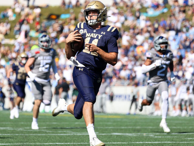 ANNAPOLIS, MARYLAND - OCTOBER 4: Blake Horvath #11 of the Navy Midshipmen points as he runs the ball to score during the third quarter against the Air Force Falcons at Navy-Marine Corps Memorial Stadium on October 4, 2025 in Annapolis, Maryland.