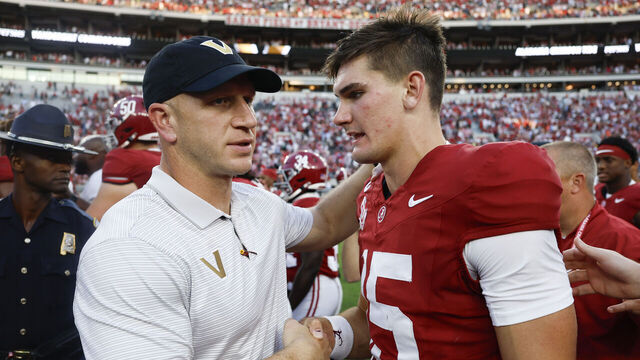 TUSCALOOSA, ALABAMA - OCTOBER 04: Clark Lea of the Vanderbilt Commodores talks with Ty Simpson #15 of the Alabama Crimson Tide after the game at Bryant-Denny Stadium on October 4, 2025 in Tuscaloosa, Alabama.