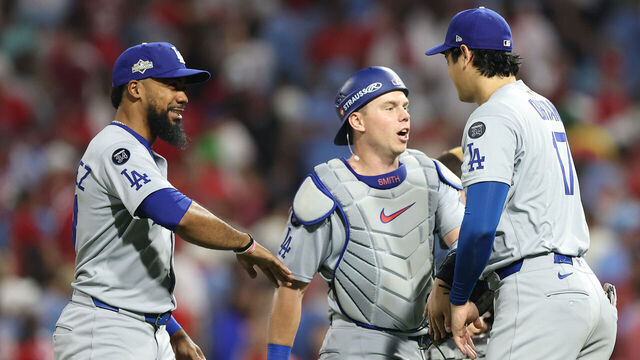 PHILADELPHIA, PENNSYLVANIA - OCTOBER 04: Teoscar Hernandez #37 of the Los Angeles Dodgers and teammates Will Smith #16 and Shohei Ohtani #17 celebrate their 5-3 win over the Philadelphia Phillies in game one of the Division Series at Citizens Bank Park on October 04, 2025 in Philadelphia, Pennsylvania.