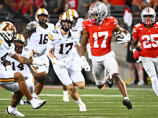COLUMBUS, OHIO - OCTOBER 4: Carnell Tate #17 of the Ohio State Buckeyes runs with the ball after making a catch in the second quarter of a game against the Minnesota Golden Gophers at Ohio Stadium on October 4, 2025 in Columbus, Ohio.