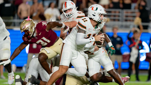TALLAHASSEE, FL - OCTOBER 04: Miami Hurricanes quarterback Carson Beck (11) scrambles during a college football game between the Miami Hurricanes and the Florida State Seminoles on October 4th, 2025 at Doak Campbell Stadium in Jacksonville, FL.
