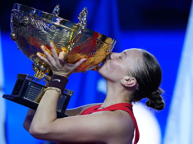 BEIJING, CHINA - OCTOBER 5:Amanda Anisimova of the United States pose with the trophy after winning the Women's Singles Final match against Linda Noskova of Czech Republic during on day 14 of the 2025 China Open at National Tennis Center on October 5, 2025 in Beijing, China.