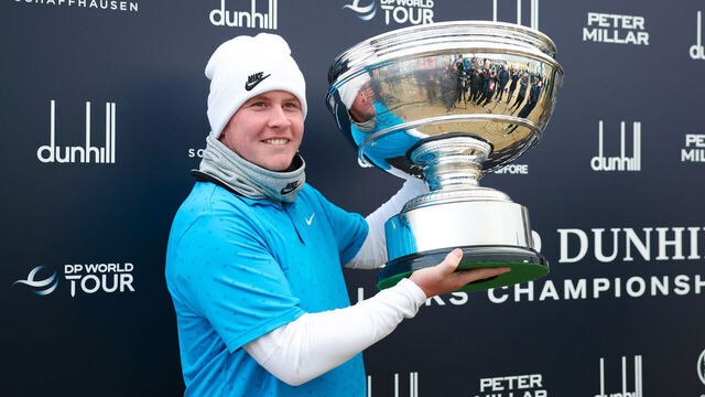 ST ANDREWS, SCOTLAND - OCTOBER 05: Robert MacIntyre of Scotland lifts the trophy after winning the Alfred Dunhill Links Championship during Day Four of the Alfred Dunhill Links Championship 2025 at St Andrews Old Course, on October 05, 2025, in St Andrews, Scotland.