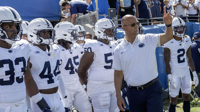 PASADENA, CALIFORNIA - OCTOBER 4: Penn State players walk onto the field with head coach James Franklin before the start of the game between the Penn State Nittany Lions and UCLA Bruins at The Rose Bowl on October 4, 2025, in Pasadena, California.