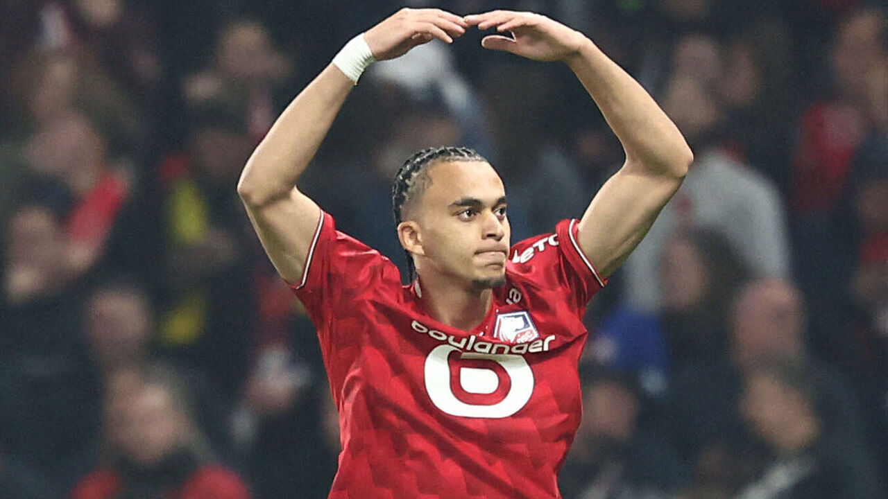 Lille's French midfielder #08 Ethan Mbappe celebrates after scoring Lille's first goal during the French L1 football match between Lille LOSC and Paris Saint-Germain (PSG) at the Stade Pierre-Mauroy in Villeneuve-d'Ascq, northern France, on October 5, 2025.