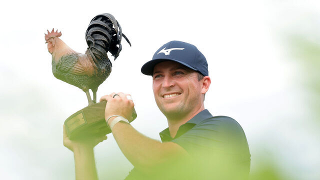 JACKSON, MISSISSIPPI - OCTOBER 05: Steven Fisk of the United States poses with the trophy on the 18th green after his winning putt during the final round of the Sanderson Farms Championship 2025 at The Country Club of Jackson on October 05, 2025 in Jackson, Mississippi.