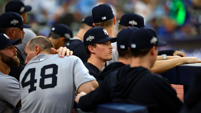 TORONTO, CANADA - OCTOBER 04: Max Fried #54 of the New York Yankees looks on from the dugout during the game against the Toronto Blue Jays at Rogers Centre on October 4, 2025 in Toronto, Canada.