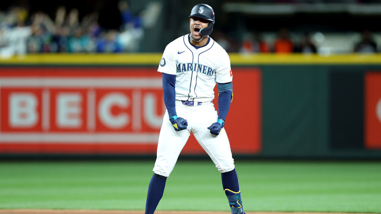 SEATTLE, WASHINGTON - OCTOBER 05: Julio Rodríguez #44 of the Seattle Mariners celebrates after hitting a RBI double against the Detroit Tigers during the eighth inning in game two of the Division Series at T-Mobile Park on October 05, 2025 in Seattle, Washington.