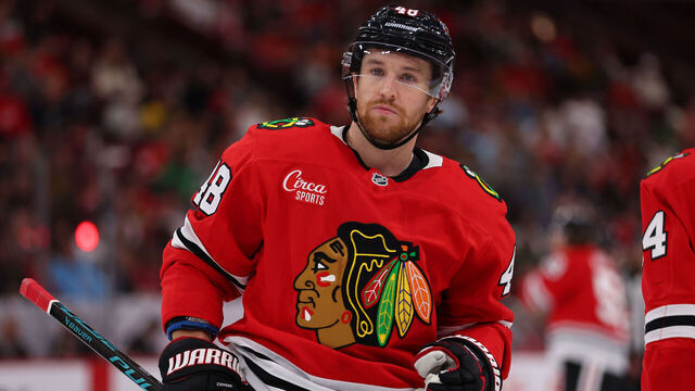 CHICAGO, IL - SEPTEMBER 30: Matt Grzelcyk #48 of the Chicago Blackhawks looks on during the first period of a preseason game against the Detroit Red Wings on September 30, 2025 at the United Center in Chicago, Illinois.