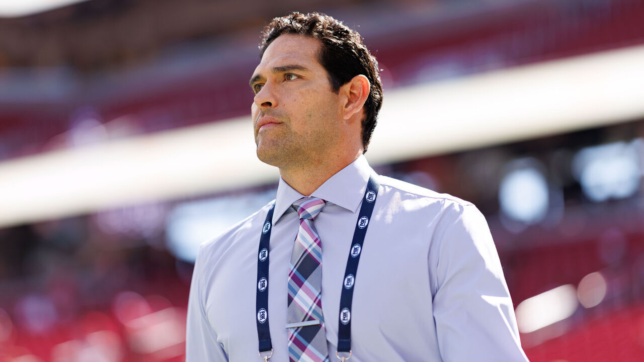 SANTA CLARA, CALIFORNIA - SEPTEMBER 21: NFL broadcaster Mark Sanchez stands on the field prior to an NFL football game between the Arizona Cardinals and the San Francisco 49ers at Levi's Stadium on September 21, 2025 in Santa Clara, California.