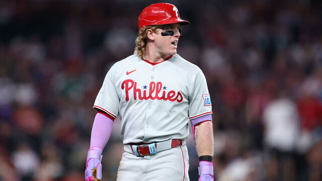 PHOENIX, ARIZONA - SEPTEMBER 21: Harrison Bader #2 of the Philadelphia Phillies walks off the field after hitting a li out during the fifth inning against the Arizona Diamondbacks at Chase Field on September 21, 2025 in Phoenix, Arizona. The Diamondbacks defeated the Phillies 9-2.
