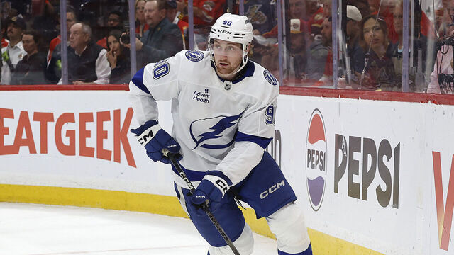 SUNRISE, FLORIDA -APRIL 28: J.J. Moser #90 of the Tampa Bay Lightning skates with the puck during first period action against the Florida Panthers in Game Four of the First Round of the 2025 Stanley Cup Playoffs at the Amerant Bank Arena on April 28, 2025 in Sunrise, Florida.