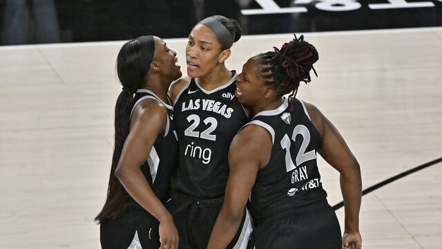 LAS VEGAS, NV - OCTOBER 5: Jackie Young #0, A'ja Wilson #22 and Chelsea Gray #12 of the Las Vegas Aces celebrates during the game against the Phoenix Mercury during Game 2 of the 2025 WNBA Finals on October 5, 2025 at Michelob ULTRA Arena in Las Vegas, Nevada. Mandatory Copyright Notice: Copyright 2025 NBAE