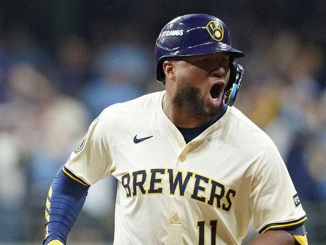 MILWAUKEE, WISCONSIN - OCTOBER 06: Jackson Chourio #11 of the Milwaukee Brewers rounds the bases after hitting a home run during the fourth inning against the Chicago Cubs in game two of the National League Division Series at American Family Field on October 06, 2025 in Milwaukee, Wisconsin.