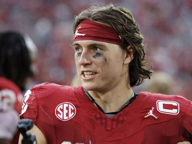 NORMAN, OKLAHOMA - SEPTEMBER 20: Quarterback John Mateer #10 of the Oklahoma Sooners records a greeting for the fans after a 24-17 win over the Auburn Tigers at Gaylord Family Oklahoma Memorial Stadium on September 20, 2025 in Norman, Oklahoma.