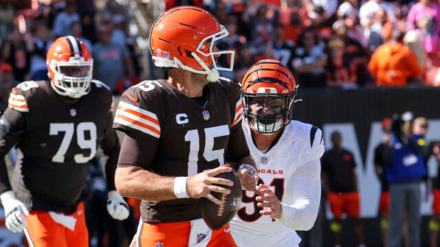 CLEVELAND, OH - SEPTEMBER 07: Cleveland Browns quarterback Joe Flacco (15) looks to pass as Cincinnati Bengals defensive end Trey Hendrickson (91) applies pressure during the fourth quarter of the National Football League game between the Cincinnati Bengals and Cleveland Browns on September 7, 2025, at Huntington Bank Field in Cleveland, OH.