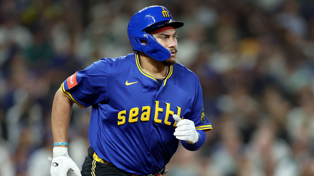 SEATTLE, WASHINGTON - SEPTEMBER 26: Josh Naylor #12 of the Seattle Mariners at bat against the Los Angeles Dodgers at T-Mobile Park on September 26, 2025 in Seattle, Washington.