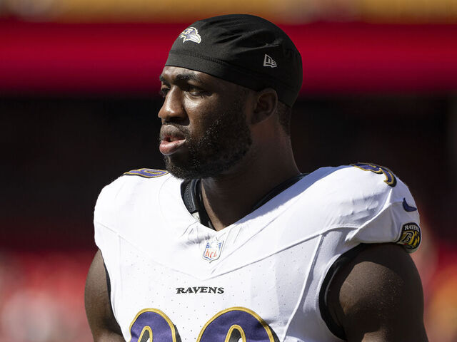 KANSAS CITY, MISSOURI - SEPTEMBER 28: Odafe Oweh #99 of the Baltimore Ravens warms up prior to the game against the Kansas City Chiefs at Arrowhead Stadium on September 28, 2025 in Kansas City, Missouri.""