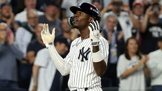 NEW YORK, NEW YORK - OCTOBER 07: Jazz Chisholm Jr. #13 of the New York Yankees reacts after hitting a solo home run against the Toronto Blue Jays during the fifth inning in game three of the American League Division Series at Yankee Stadium on October 07, 2025 in the Bronx borough of New York City.