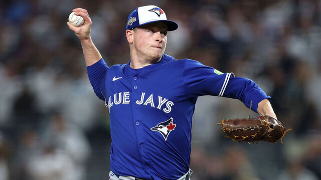 NEW YORK, NEW YORK - OCTOBER 07: Louis Varland #77 of the Toronto Blue Jays pitches against the New York Yankees during the fifth inning in game three of the American League Division Series at Yankee Stadium on October 07, 2025 in the Bronx borough of New York City.