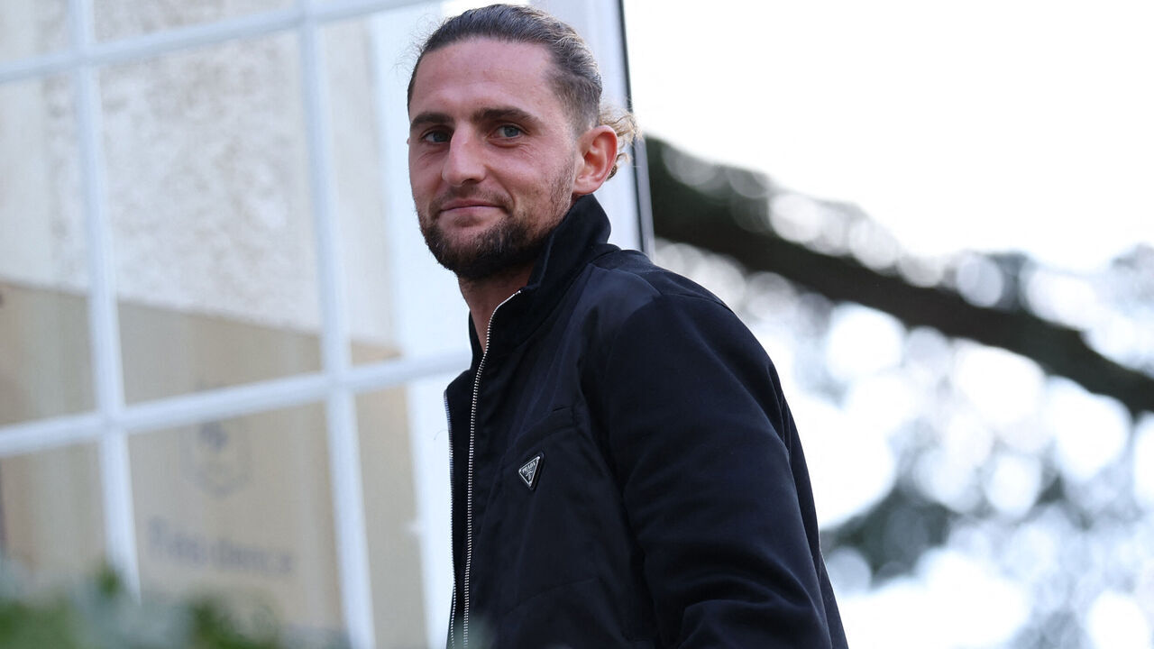 France's midfielder #14 Adrien Rabiot arrives for a training session at the team's training grounds in Clairefontaine-en-Yvelines, southwest of Paris on October 6, 2025, as part of preparations for their upcoming FIFA World Cup 2026 Group D European qualification football matches against Azerbaijan and Iceland.