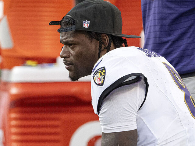 KANSAS CITY, MISSOURI - SEPTEMBER 28: Lamar Jackson #8 of the Baltimore Ravens sits on the sidelines during the fourth quarter of the game against the Kansas City Chiefs at Arrowhead Stadium on September 28, 2025 in Kansas City, Missouri.""