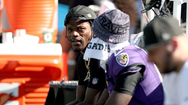 BALTIMORE, MARYLAND - OCTOBER 05: Quarterback Lamar Jackson #8 of the Baltimore Ravens sits on the bench during the second half against the Houston Texans at M&T Bank Stadium on October 05, 2025 in Baltimore, Maryland.