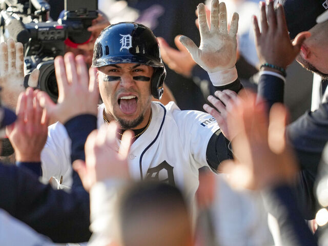 DETROIT, MI - OCTOBER 08: Javier Báez #28 of the Detroit Tigers celebrates with teammates in the dugout after hitting a two-run home run in the sixth inning during Game Four of the American League Division Series presented by Booking.com between the Seattle Mariners and the Detroit Tigers at Comerica Park on Wednesday, October 8, 2025 in Detroit, Michigan.