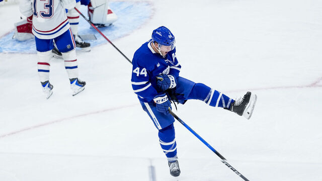 TORONTO, CANADA - OCTOBER 8: Morgan Rielly #44 of the Toronto Maple Leafs celebrates scoring a goal during the third period against the Montreal Canadiens at the Scotiabank Arena on October 8, 2025 in Toronto, ON, Canada.