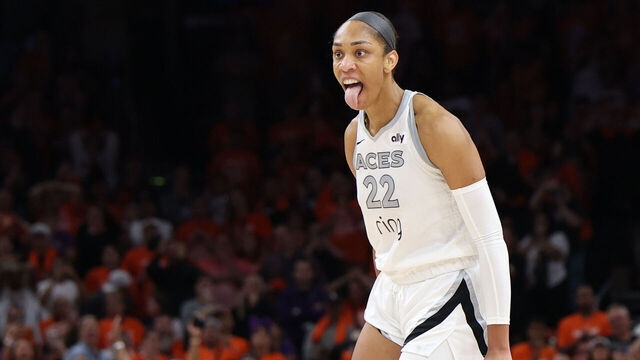 PHOENIX, ARIZONA - OCTOBER 08: A'ja Wilson #22 of the Las Vegas Aces reacts after her made basket against the Phoenix Mercury with less than one second left in the fourth quarter of Game Three of the 2025 WNBA Playoffs finals at Mortgage Matchup Center on October 08, 2025 in Phoenix, Arizona.