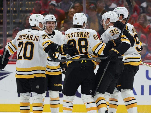 WASHINGTON, DC - OCTOBER 08: David Pastrnak #88 of the Boston Bruins celebrates with teammates after scoring a goal against the Washington Capitals during the second period at Capital One Arena on October 8, 2025 in Washington, DC.