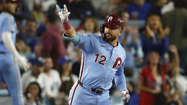 LOS ANGELES, CALIFORNIA - OCTOBER 08: Kyle Schwarber #12 of the Philadelphia Phillies reacts after hitting a solo home run against the Los Angeles Dodgers during the fourth inning in game three of the National League Division Series at Dodger Stadium on October 08, 2025 in Los Angeles, California.