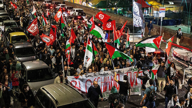NAPLES, ITALY - 2025/10/08: Pro-Palestinian demonstrators walk on the Naples' streets protesting for the immediate end to the genocide in Gaza and against the interception of the second Flotilla which started from Turkey by the Israeli army.