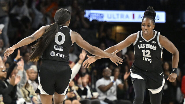 LAS VEGAS, NV - SEPTEMBER 30: Jackie Young #0 & Chelsea Gray #12 of the Las Vegas Aces high five during the game against the Indiana Fever during Game 5 of the Semi Finals during the WNBA Playoffs on September 30, 2025 at Michelob ULTRA Arena in Las Vegas, Nevada. Mandatory Copyright Notice: Copyright 2025 NBAE