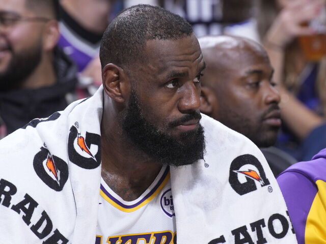 SACRAMENTO, CA - DECEMBER 21: LeBron James #23 of the Los Angeles Lakers looks on from the bench during the game against the Sacramento Kings on December 21, 2024 at Golden 1 Center in Sacramento, California. NOTE TO USER: User expressly acknowledges and agrees that, by downloading and or using this photograph, User is consenting to the terms and conditions of the Getty Images Agreement. Mandatory Copyright Notice: Copyright 2024 NBAE