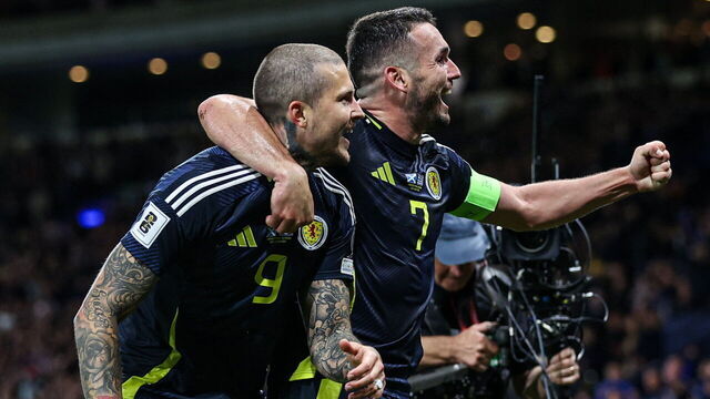 GLASGOW, SCOTLAND - OCTOBER 09: Scotland's Lyndon Dykes celebrates John McGinn with as he scores to make it 3-1 during a 2026 FIFA World Cup Qualifying match between Scotland and Greece at Hampden Park, on October 09, 2025, in Glasgow, Scotland.
