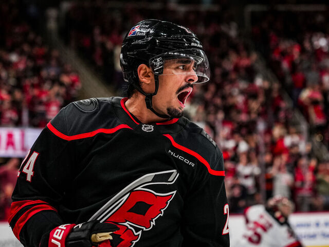 RALEIGH, NORTH CAROLINA - OCTOBER 09: Seth Jarvis #24 of the Carolina Hurricanes celebrates after a goal during the third period against the New Jersey Devils at Lenovo Center on October 09, 2025 in Raleigh, North Carolina.