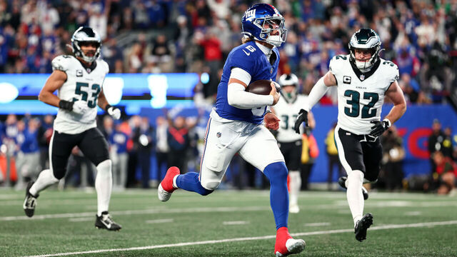 EAST RUTHERFORD, NEW JERSEY - OCTOBER 9: Jaxson Dart #6 of the New York Giants runs with the ball for a touchdown during the first quarter against the Philadelphia Eagles at MetLife Stadium on October 9, 2025 in East Rutherford, New Jersey.