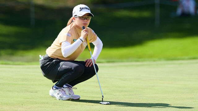 Japan's Minami Katsu lines up a putt during the Shanghai LPGA golf tournament in Shanghai on October 10, 2025.