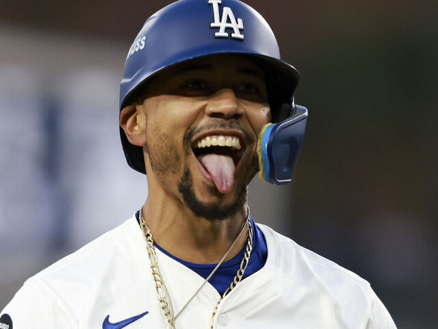 LOS ANGELES, CA - OCTOBER 08: Mookie Betts #50 of the Los Angeles Dodgers reacts after hitting a triple during Game Three of the National League Division Series presented by Booking.com between the Philadelphia Phillies and the Los Angeles Dodgers at Dodger Stadium on Wednesday, October 8, 2025 in Los Angeles, California.