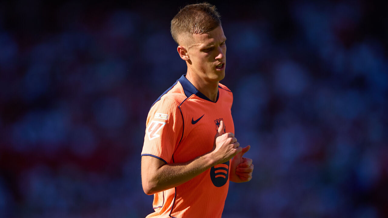 SEVILLE, SPAIN - OCTOBER 05: Dani Olmo of FC Barcelona looks on during the LaLiga EA Sports match between Sevilla FC and FC Barcelona at Estadio Ramon Sanchez Pizjuan on October 05, 2025 in Seville, Spain.